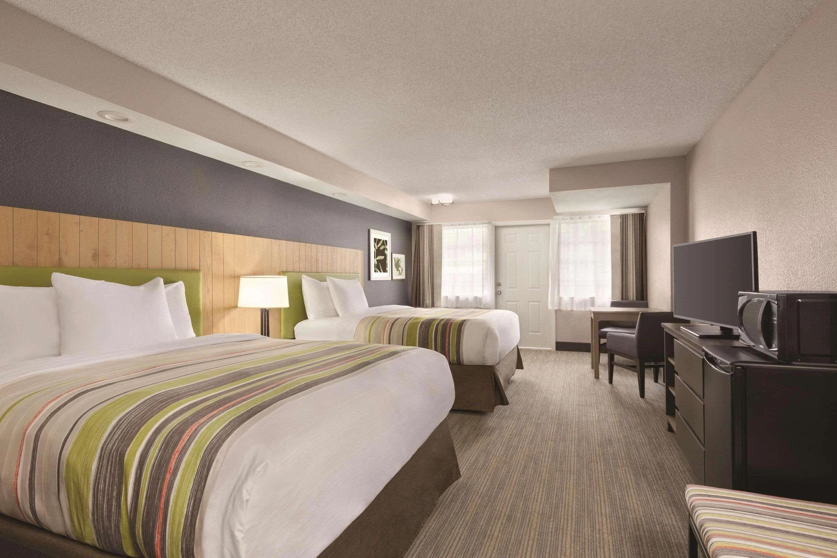 Spacious guest room with two beds